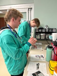 students learn about the lab